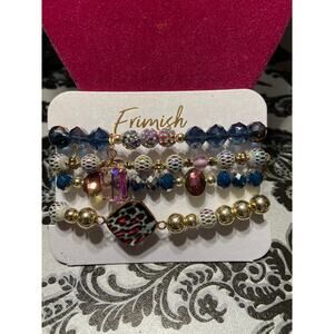 Erimish gold beaded stack of bracelets with removable charm